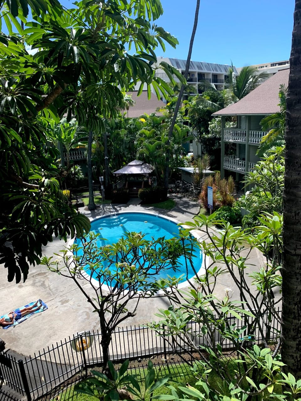 The lanai overlooks the pool area.  There is also a hot tub, chairs and BBQ.