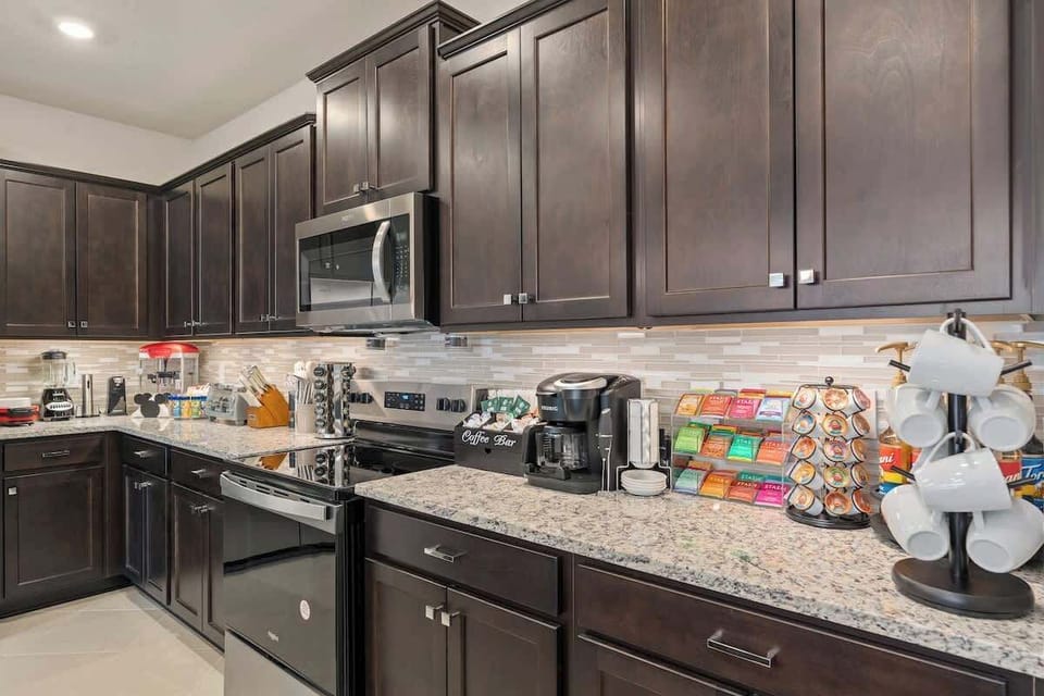 Fully stocked kitchen includes all essential cookware, dinnerware, cups, silverware, small appliances, and more. Supplies for maximum guest count are provided for a hassle-free experience. 