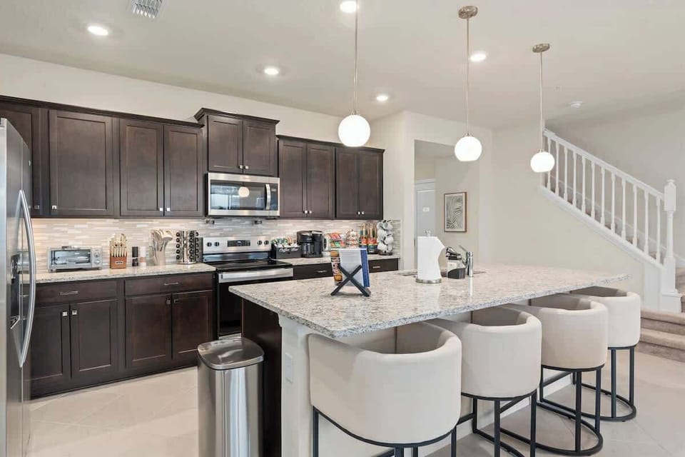 Fully stocked kitchen includes all essential cookware, dinnerware, cups, silverware, small appliances, and more. Supplies for maximum guest count are provided for a hassle-free experience. 