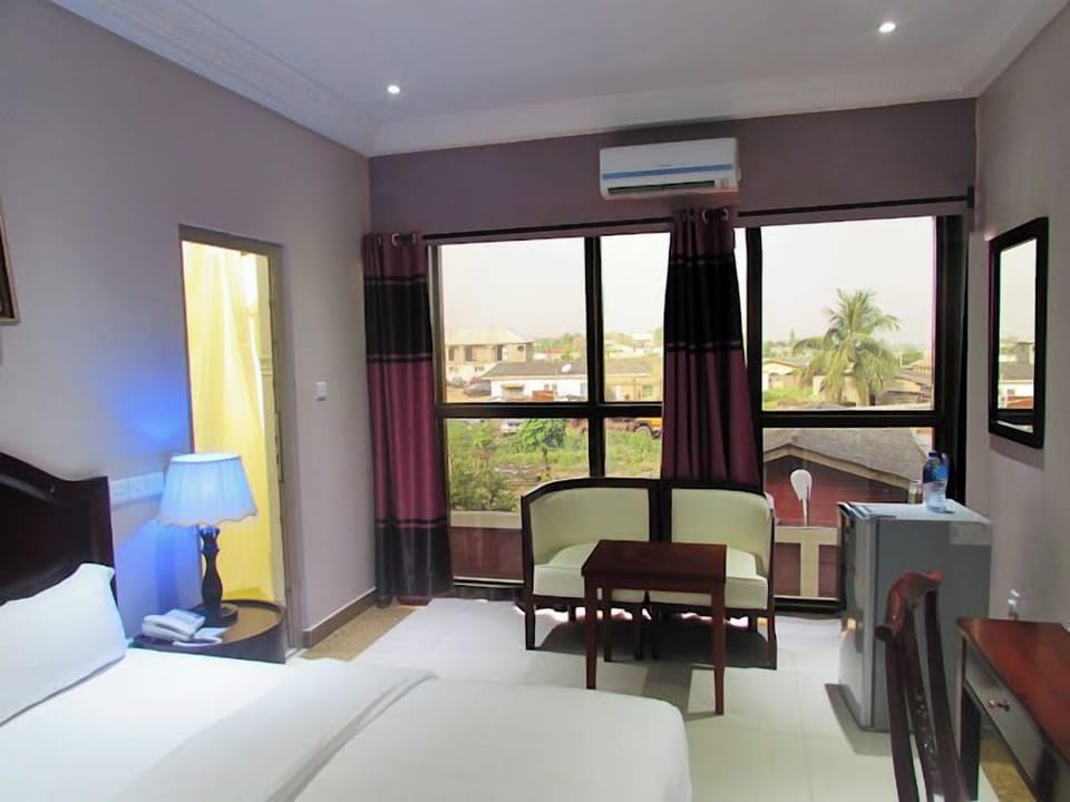 Deluxe Room, Balcony, City View | Desk, laptop workspace, soundproofing, free WiFi
