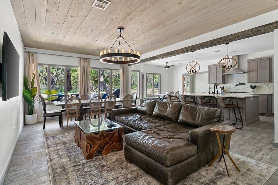 Stylish open-concept living with rustic charm and modern elegance.