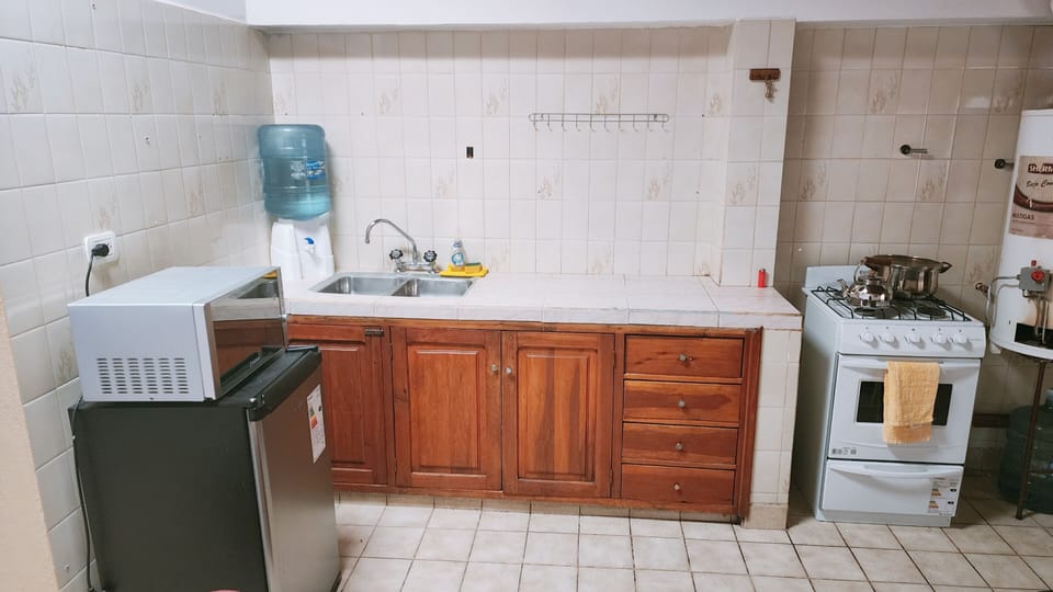 Comfort Apartment | Private kitchen | Full-size fridge, oven