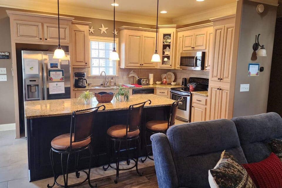 Kitchen with large granite island 