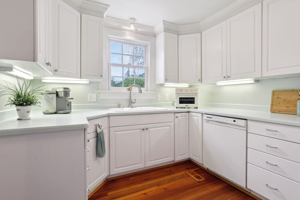 The kitchen has everything you need for your extended stay - dishwasher, stove, oven, microwave, refrigerator.