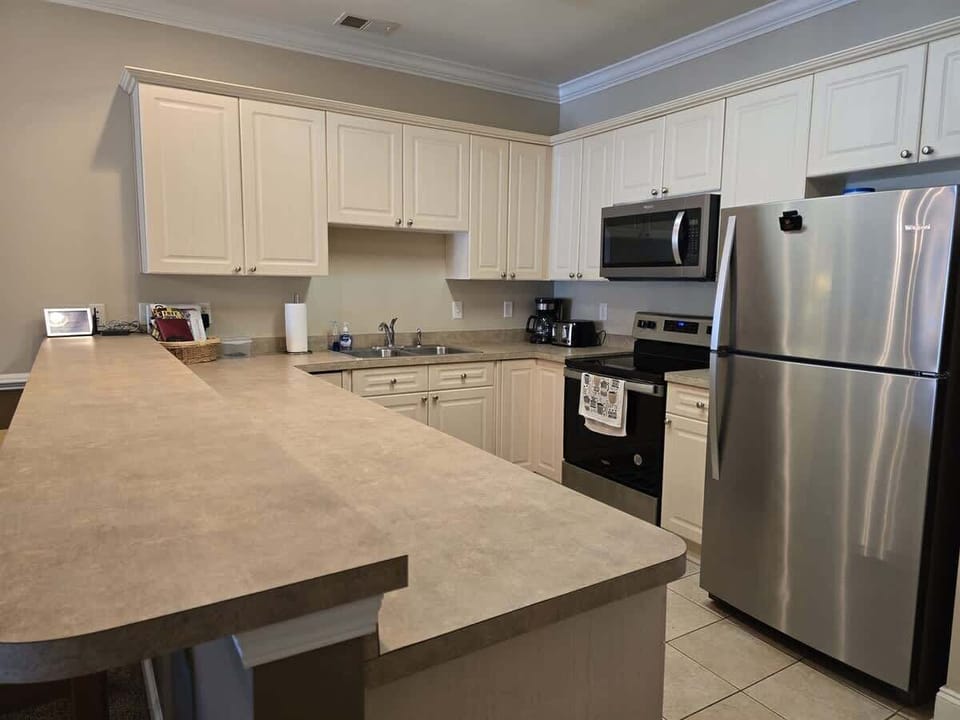 Full kitchen and all your cooking essentials = stress-free vacation living