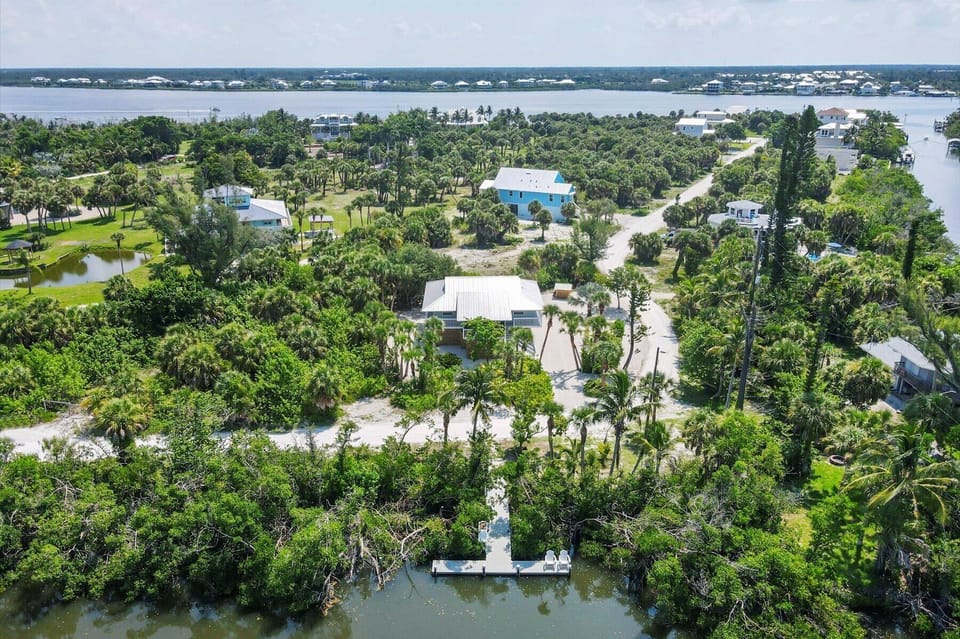 House and dock.  Canal leads out to the intercoastal. 