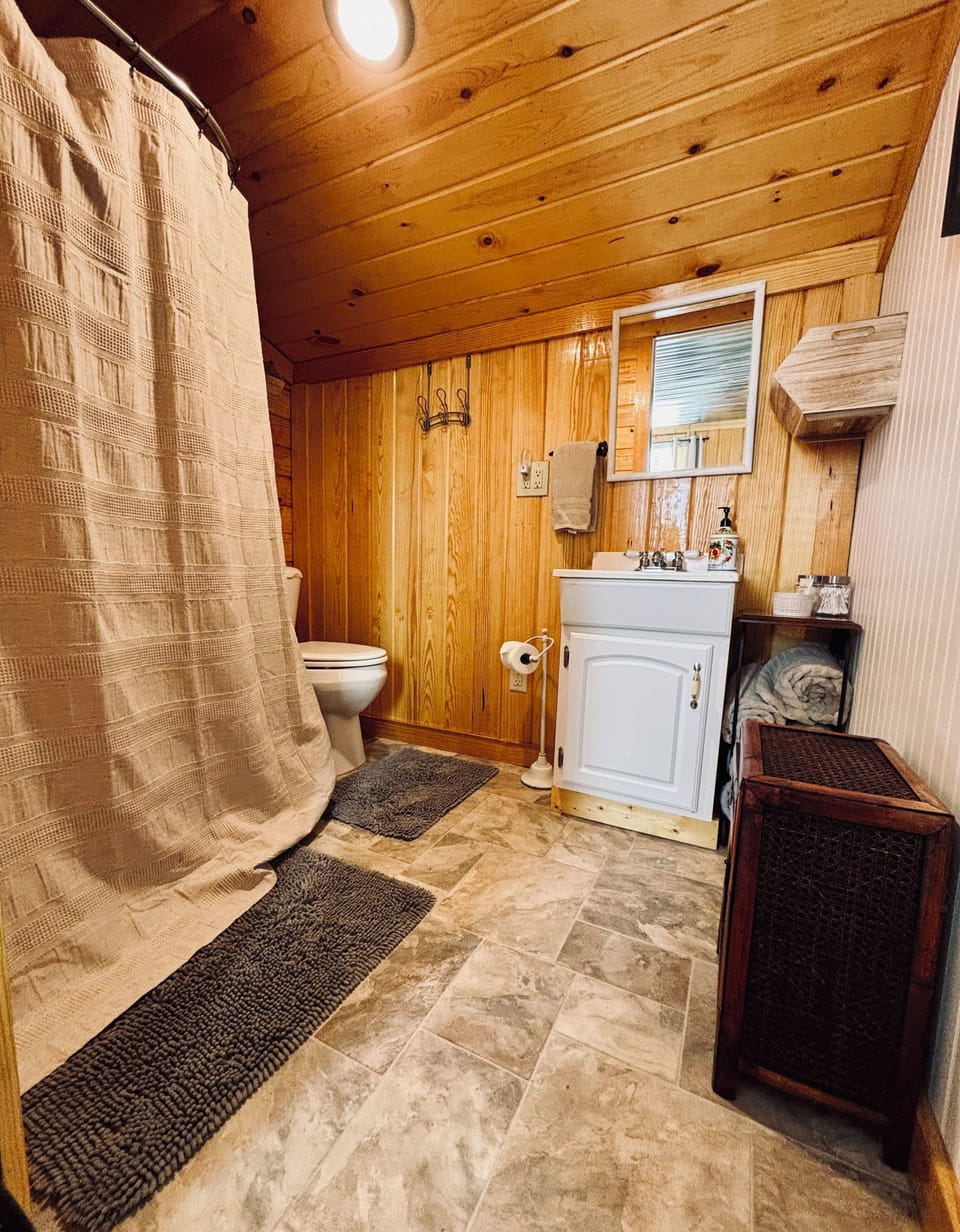 Full bathroom with shower and everything you need to refresh