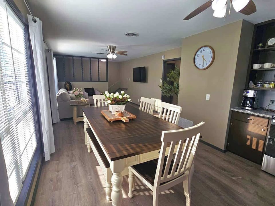 Welcome to our dining room, a warm and inviting space perfect for sharing meals and making memories.