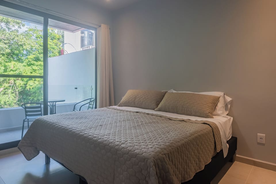 Master bedroom with king king-size bed