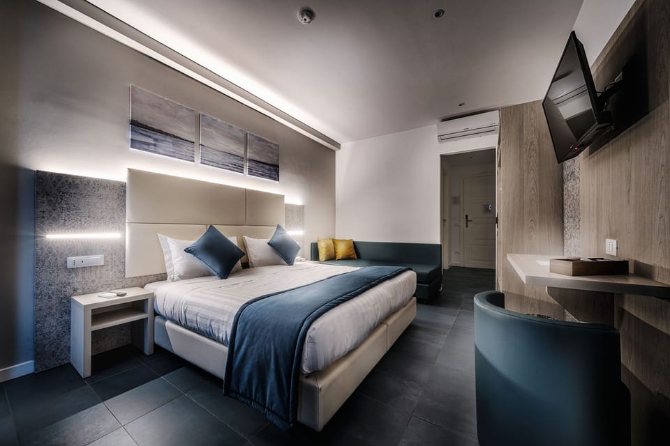 Family Triple Room | In-room safe, desk, laptop workspace, iron/ironing board