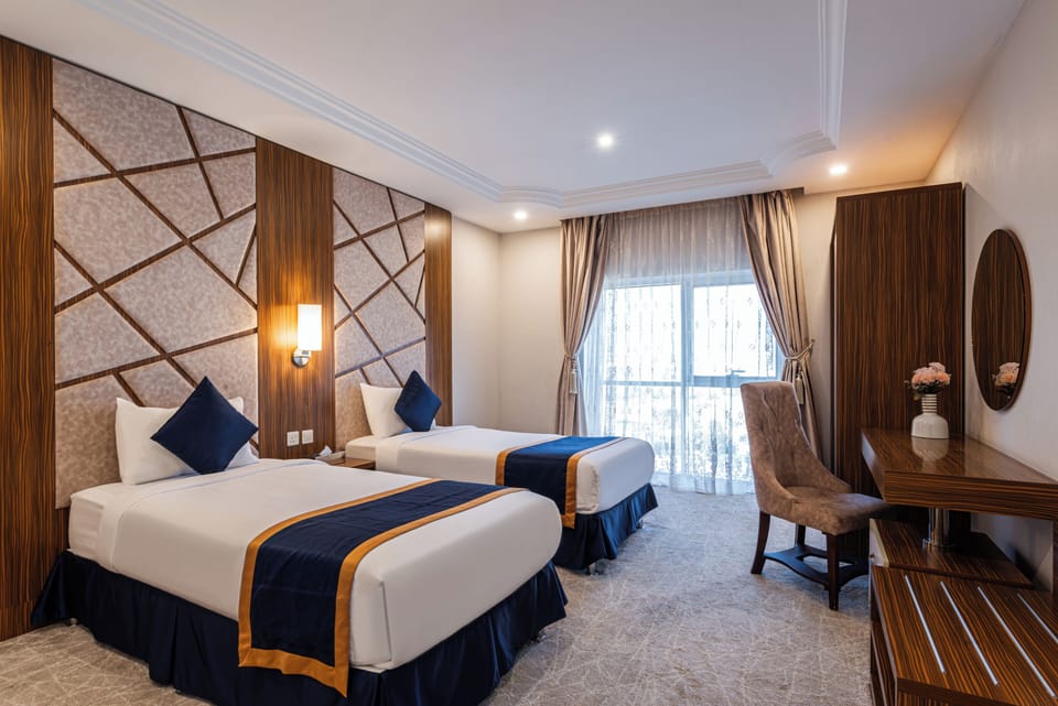 Family Suite, City View | Egyptian cotton sheets, premium bedding, minibar, in-room safe