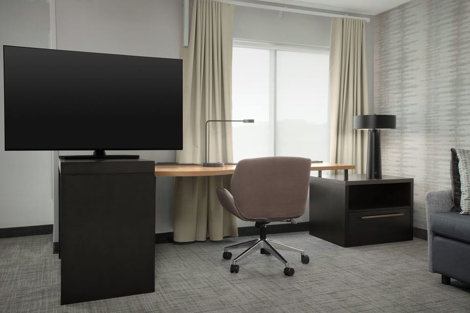 Premium bedding, blackout drapes, iron/ironing board, free WiFi