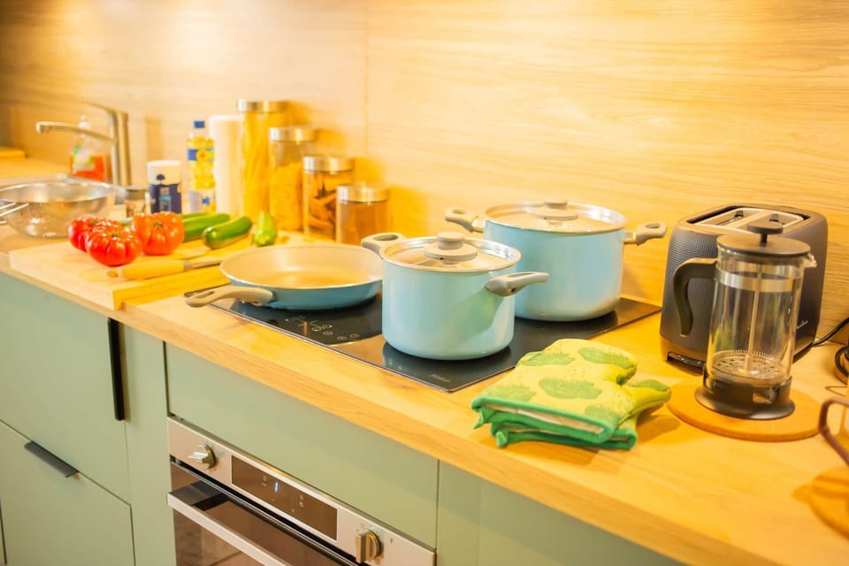 Prepare your meals just like at home in our welcoming, fully equipped kitchen. Need more info before booking? Contact us, we'll be happy to answer.
