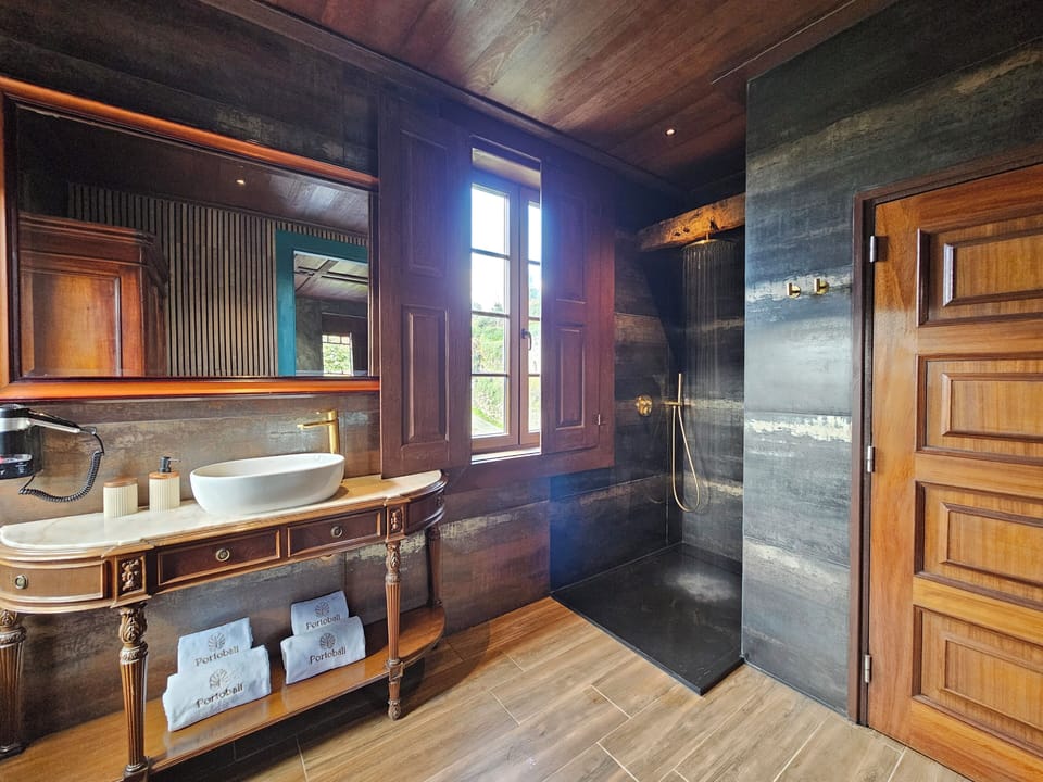 Shower, rainfall showerhead, eco-friendly toiletries, hair dryer