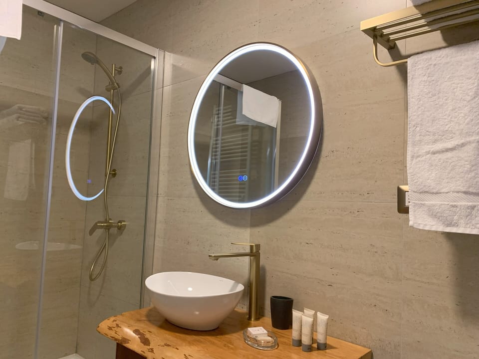 Suite, Sea View | Bathroom | Shower, hair dryer, towels, soap