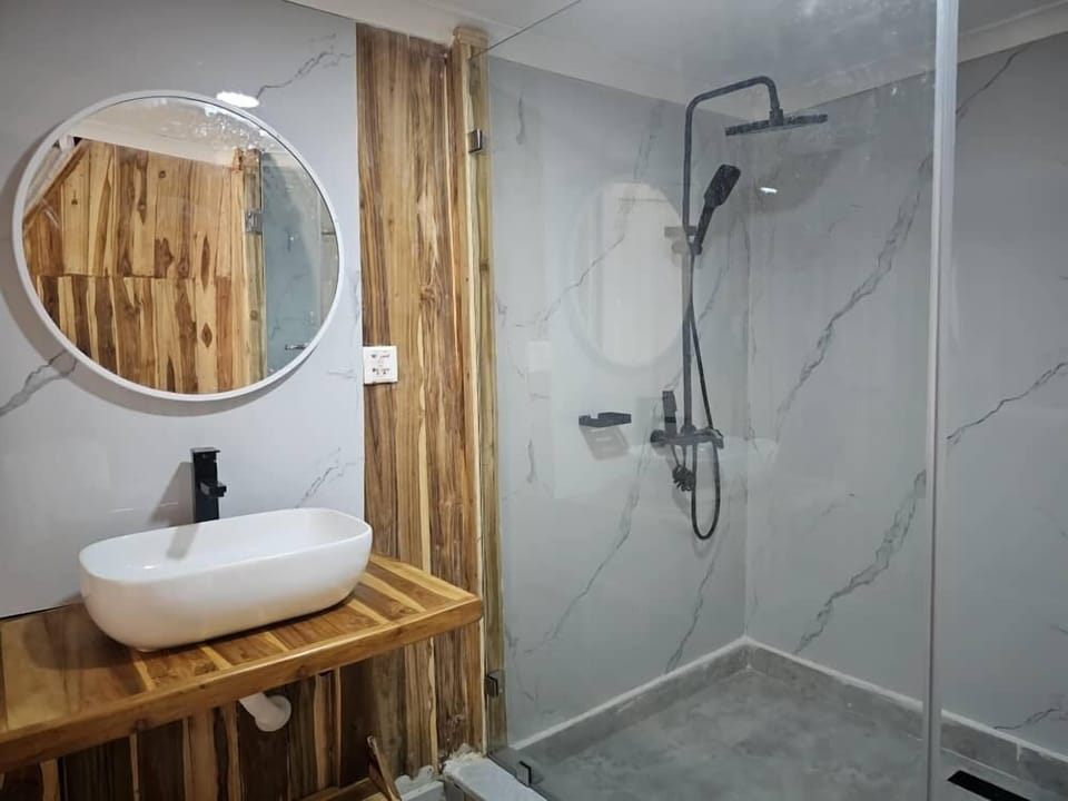 Shower, towels, soap, shampoo