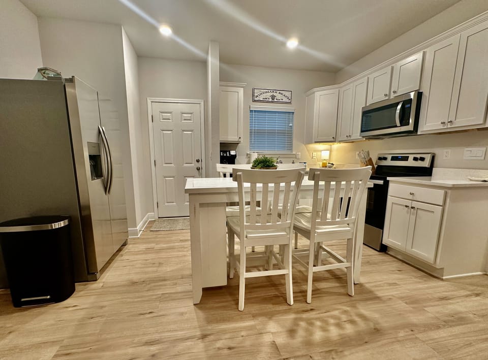 In-law-suite kitchen. Seat 4 at island. Also makes great remote work space!