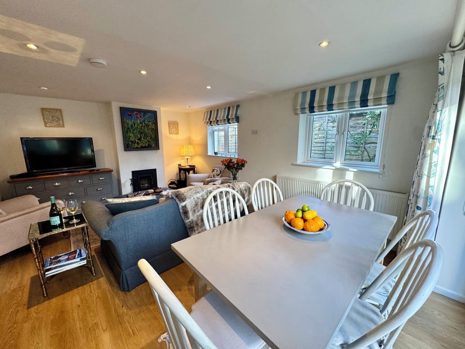 Open plan living area with dining table