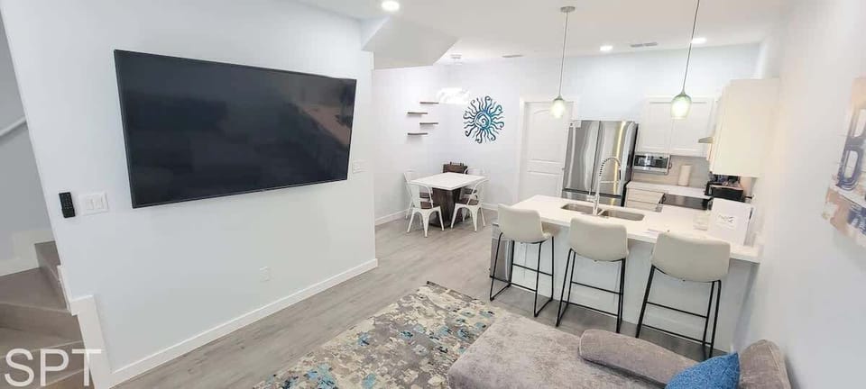 Townhome, Multiple Beds, Kitchen, Garden View (Villas de Laguna 2) | Living area | 75-inch flat-screen TV with digital channels