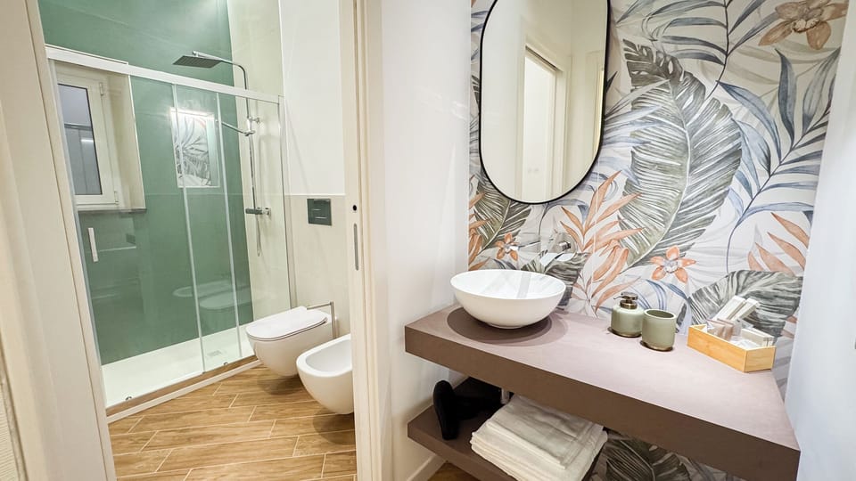 Classic Townhome | Bathroom | Hair dryer, bidet, towels, soap