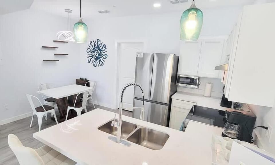 Condo, Multiple Beds, Kitchen, Garden View (Villas de Laguna 3) | Private kitchen | Fridge, microwave, oven, stovetop