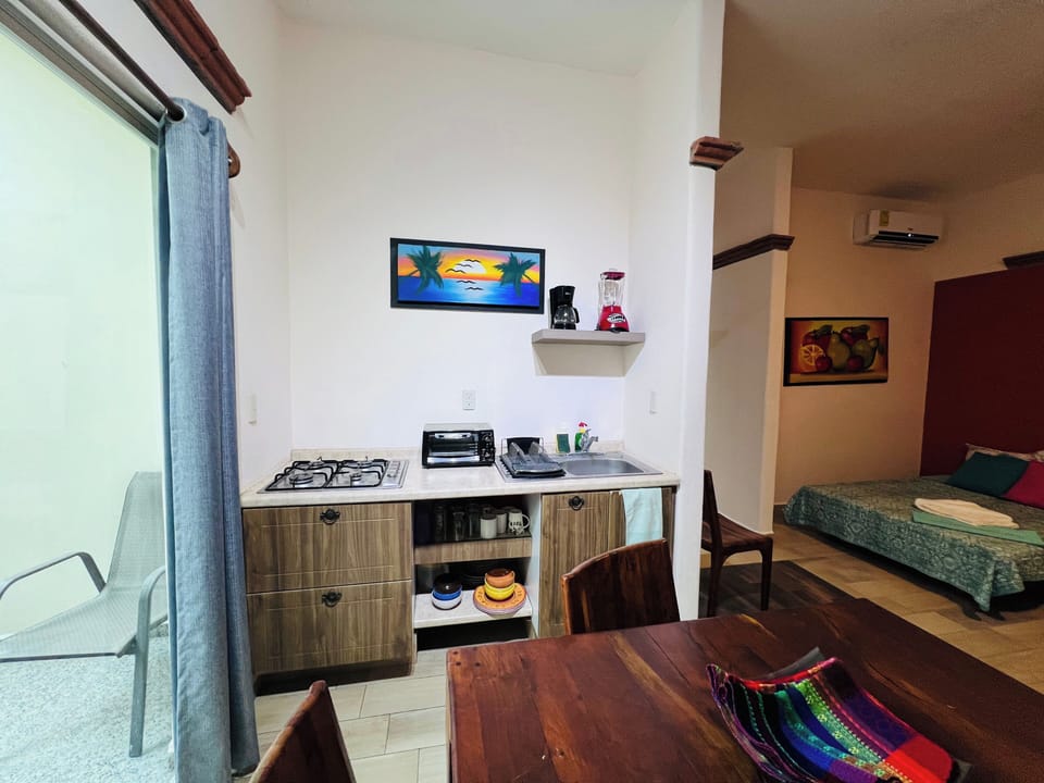 Family Room | Private kitchen | Mini-fridge, blender, toaster oven