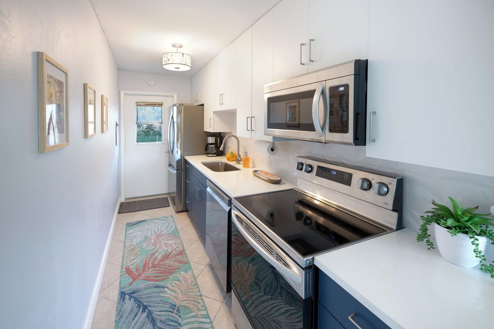 The kitchen is stocked with all the essentials and full-sized appliance