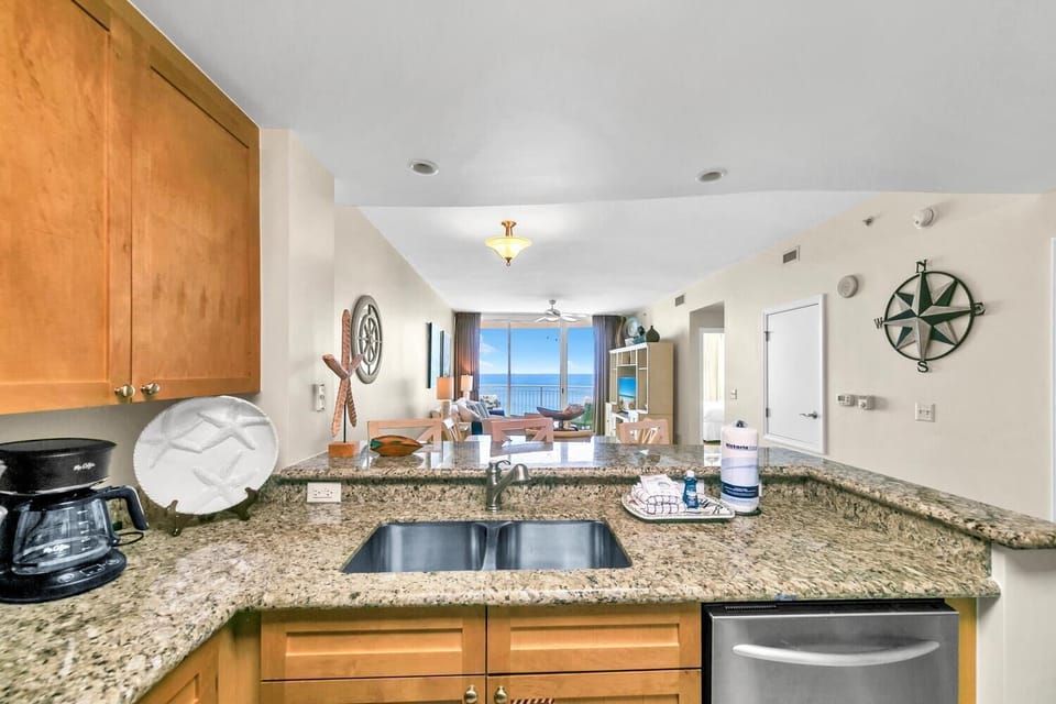 Condo, Multiple Beds (Aqua Resort 1207) | Private kitchen | Oven, toaster, cookware/dishes/utensils
