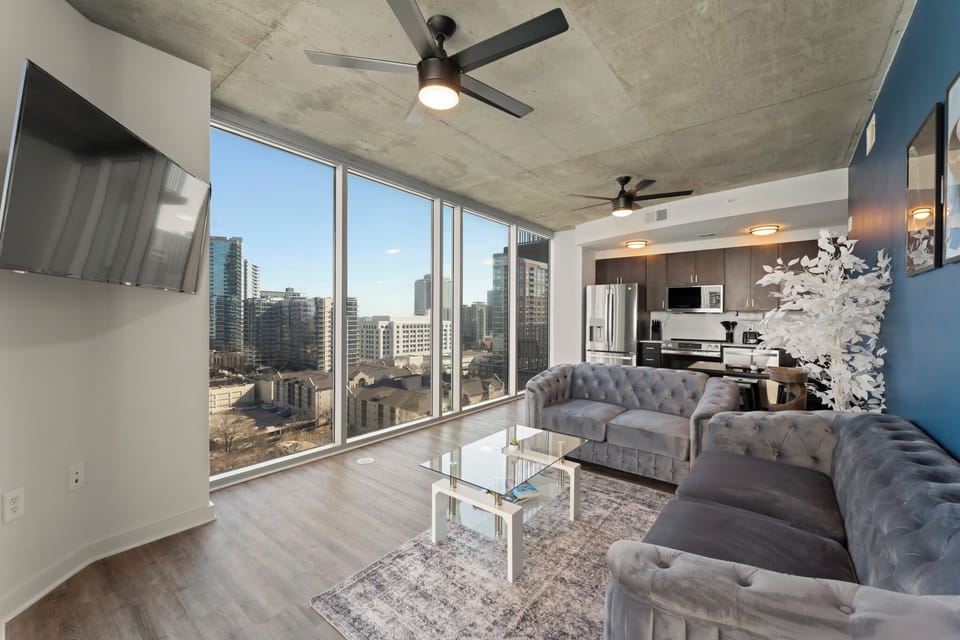 Open space living room with 55-inch canvas of a TV screen
