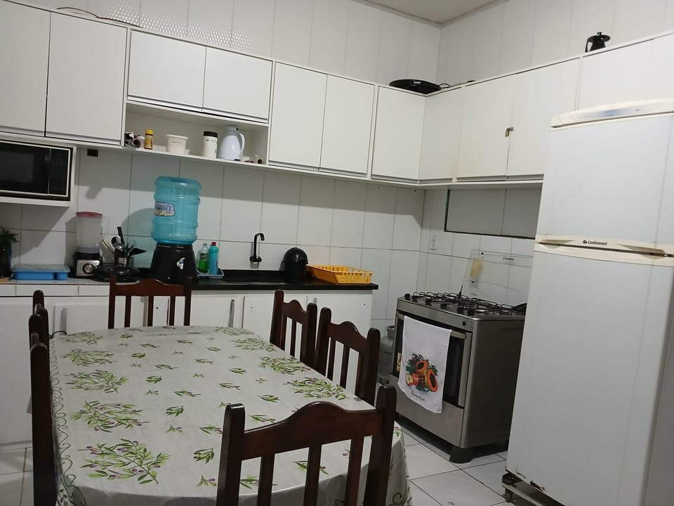 City Apartment, 2 Bedrooms | Private kitchen | Full-size fridge, microwave, oven, cookware/dishes/utensils