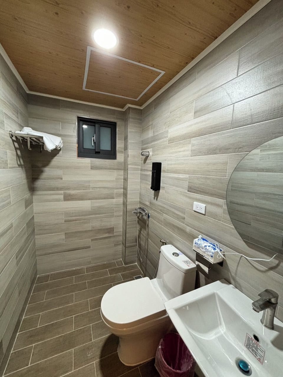 Shower, hair dryer, slippers, towels