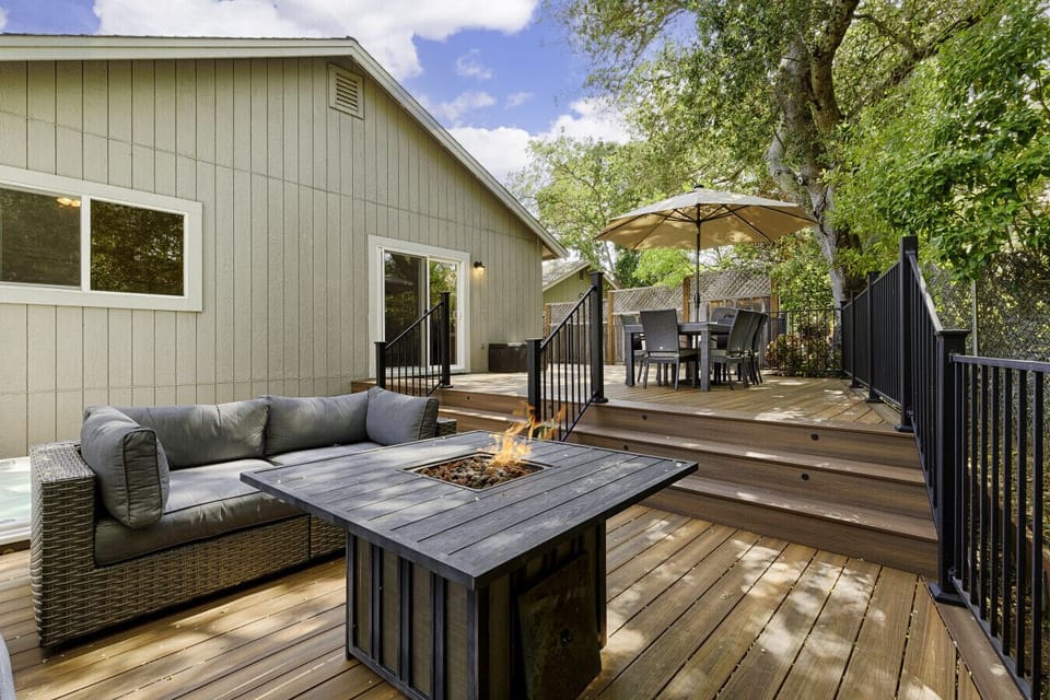 Firepit surrounded by comfortable outdoor patio seating