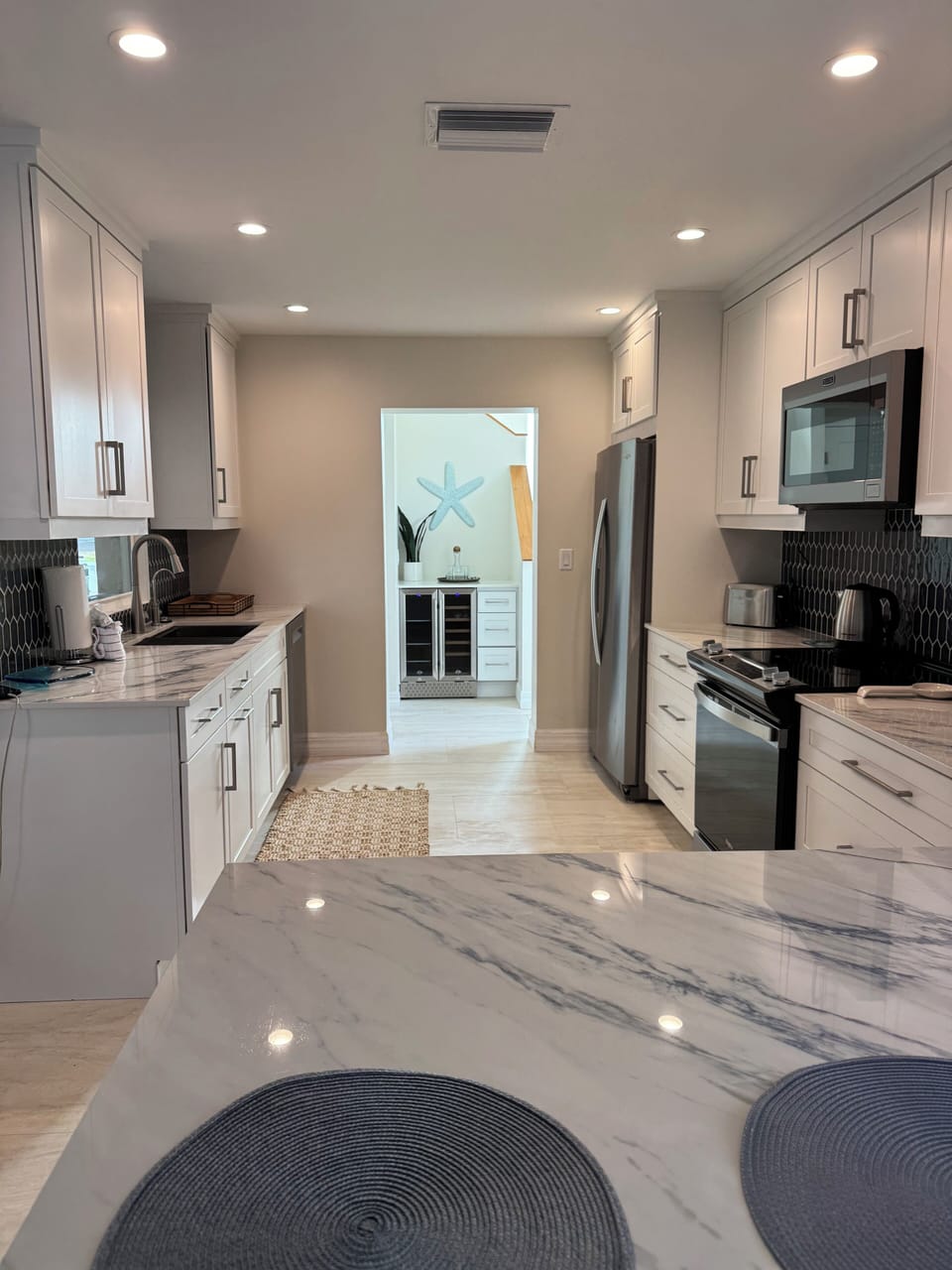 New kitchen with top end appliances and all the cooking items you need