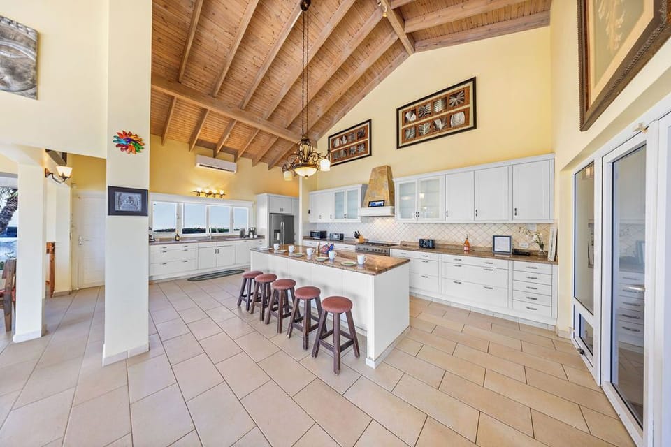 Spacious kitchen with a large island, perfect for gatherings.