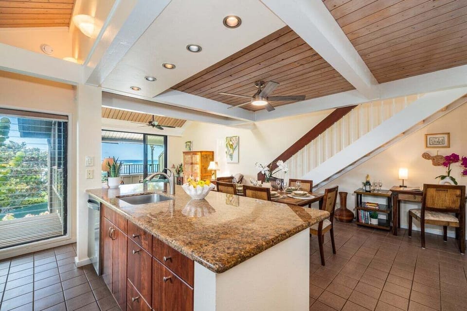 Spacious kitchen with plenty of counter space and a seamless flow into the dining area