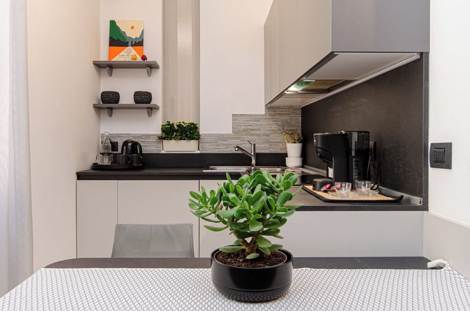 Apartment | Private kitchen | Full-size fridge, microwave, oven, stovetop