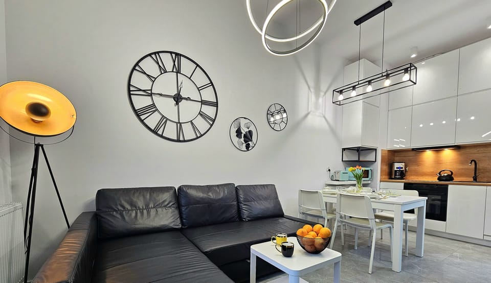 Comfort Apartment | Living area | Flat-screen TV