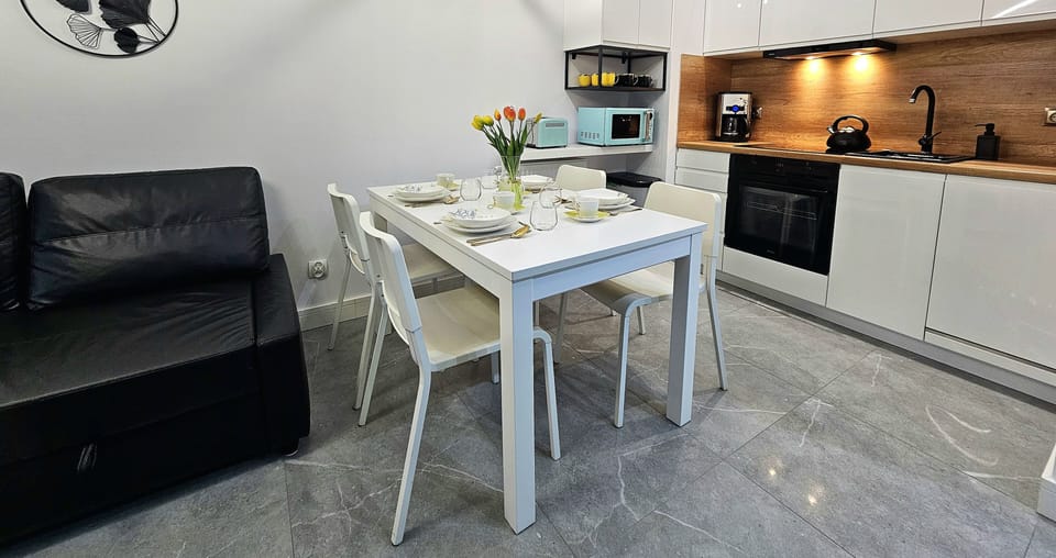 Comfort Apartment | Living area | Flat-screen TV