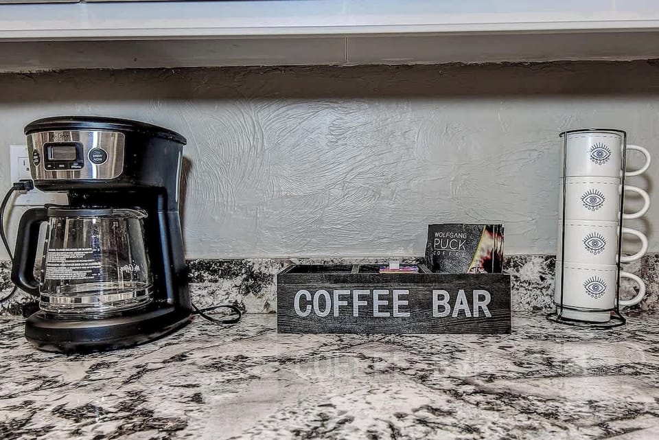 Brew, sip, repeat!  This cozy coffee bar area is your personal café at home—where every cup is made just the way you love it. Start your day right or unwind with your favorite brew #CoffeeLoversHaven 