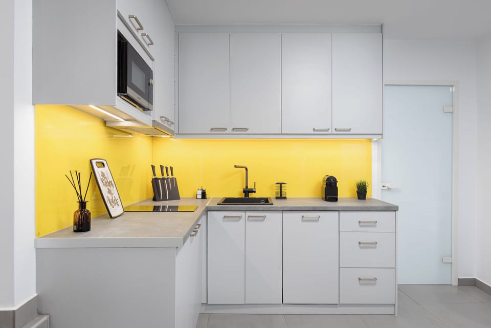 Apartment | Private kitchen | Full-size fridge, microwave, dishwasher, espresso maker