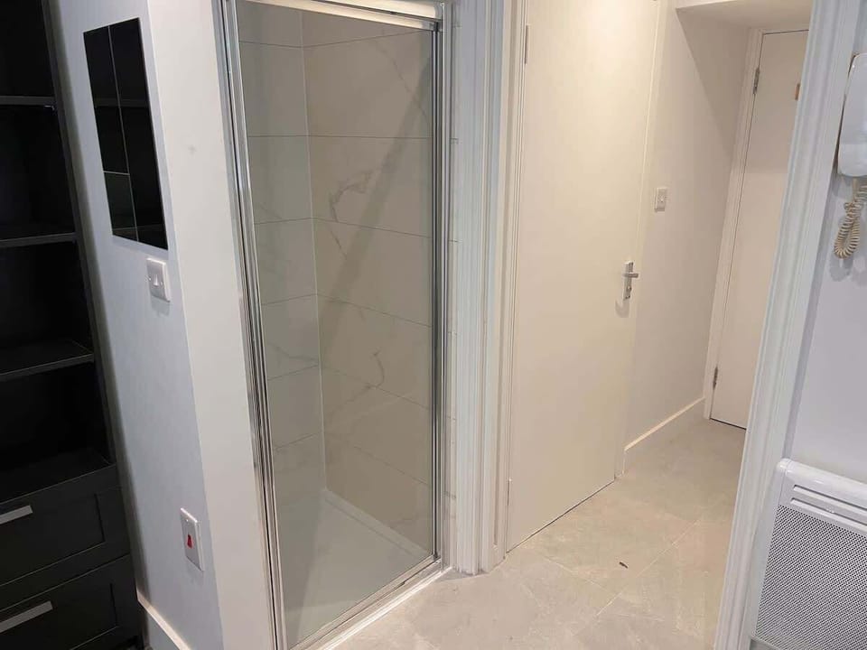 refresh and rejuvenate in this sleek modren bathroom