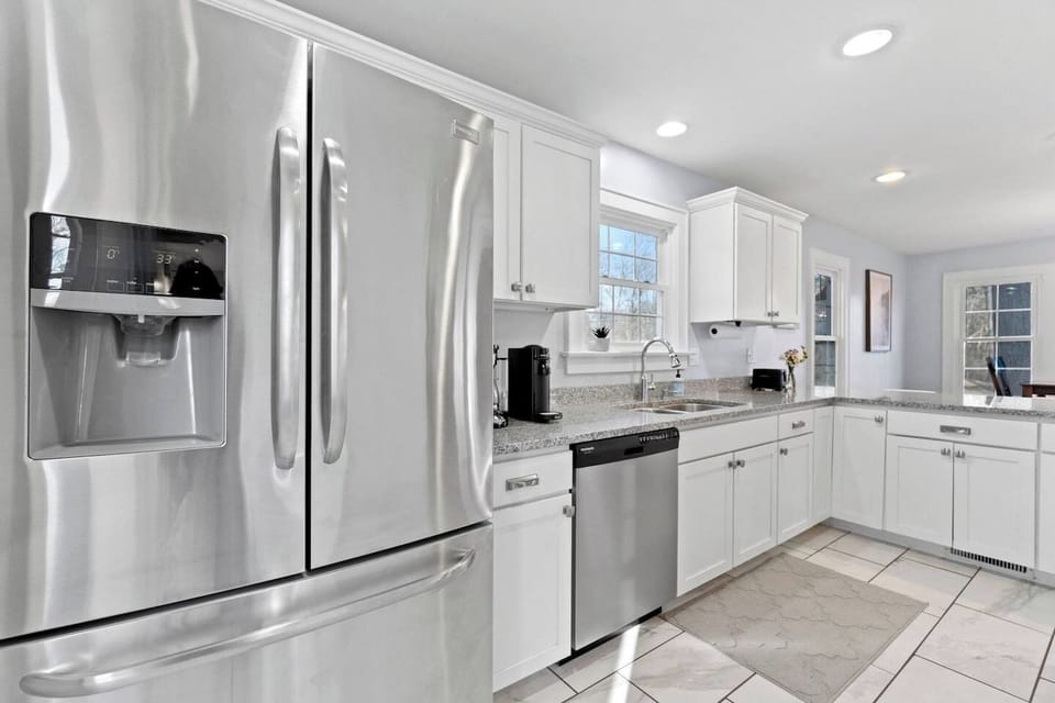 Stock up at the nearby Trader Joe's and cook with ease. This bright white kitchen features premium stainless steel appliances and an effortless layout for the group chef to work magic.