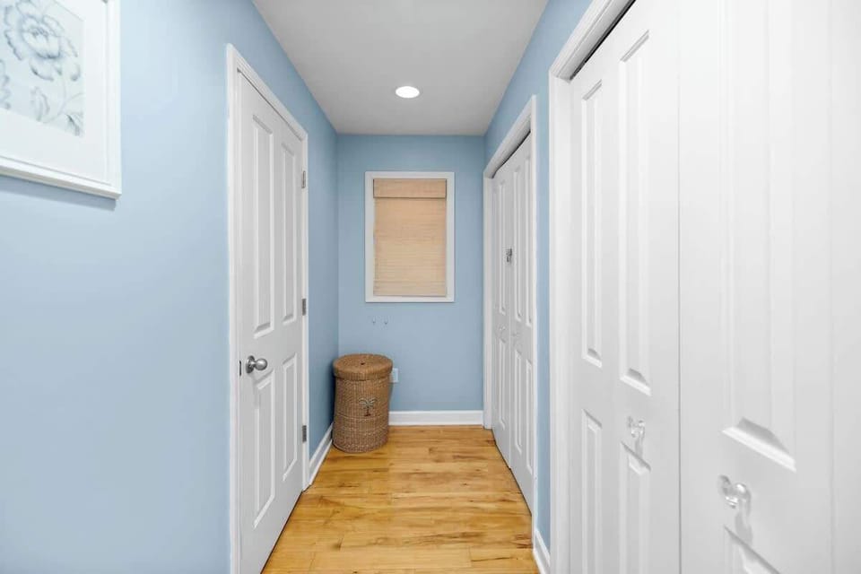 Calm, clean, and perfectly organized—just how a hallway should be!