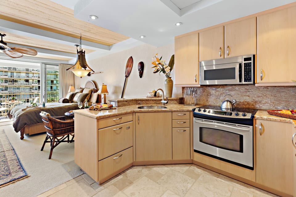 Cook with ease in a thoughtfully designed, fully equipped kitchen. Featuring modern appliances, ample counter space, and all the essentials you need, from quick island breakfasts to full home-cooked dinners.
