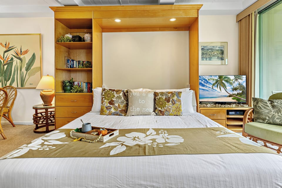 Sink into a plush murphy bed ,king-size, designed for ultimate comfort. Soft linens, cloud-like pillows, and a cozy, inviting feel to make it the perfect place to unwind after a day in paradise.