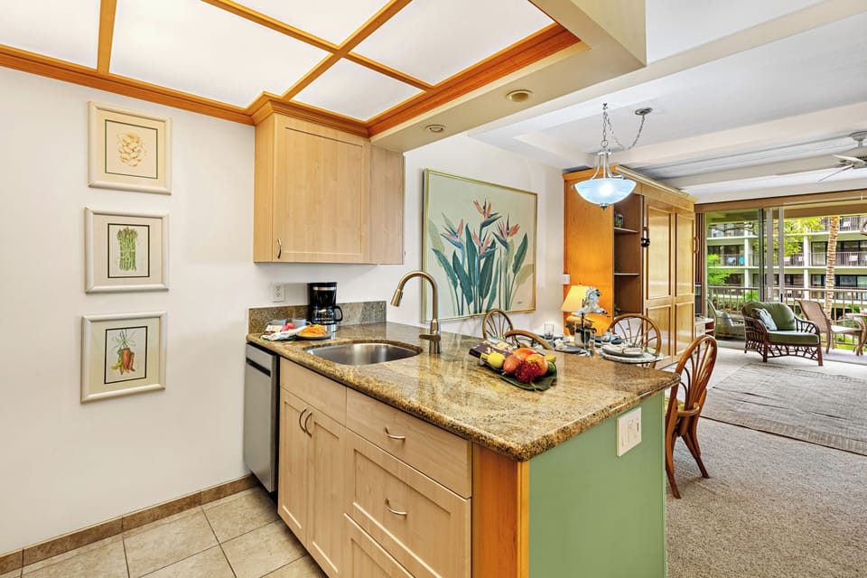 Fully equipped kitchen with a generous breakfast bar, comfortable seating, and modern appliances. Ideal for casual dining or enjoying your morning coffee before a day in paradise