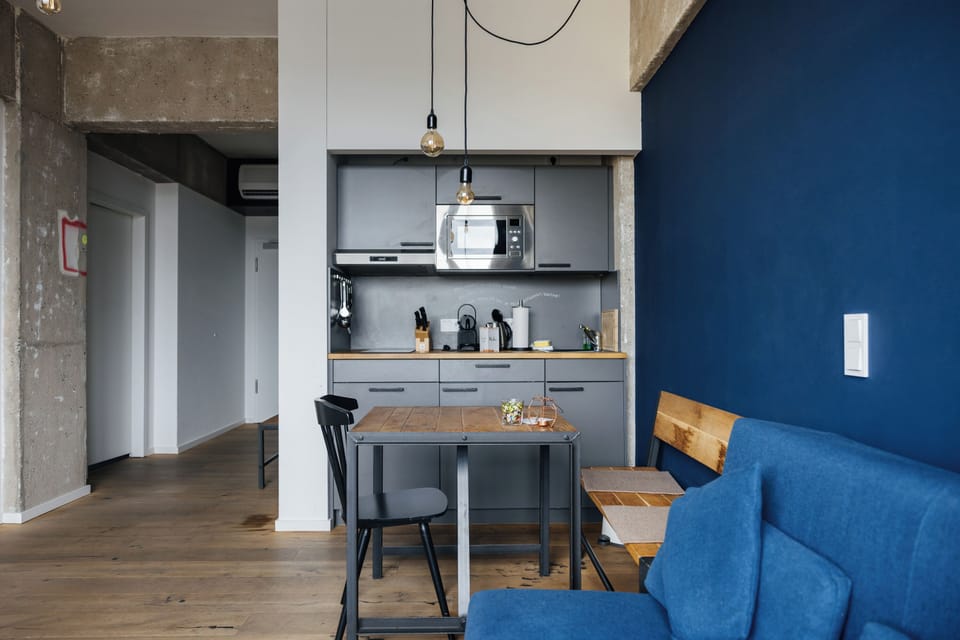 Family Apartment | Private kitchenette | Fridge, microwave, stovetop, dishwasher