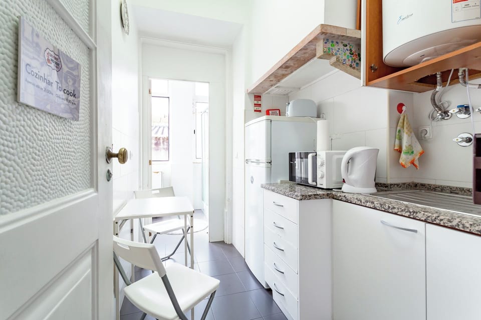 Economy Shared Dormitory, City View | Shared kitchen | Fridge, microwave, oven, stovetop