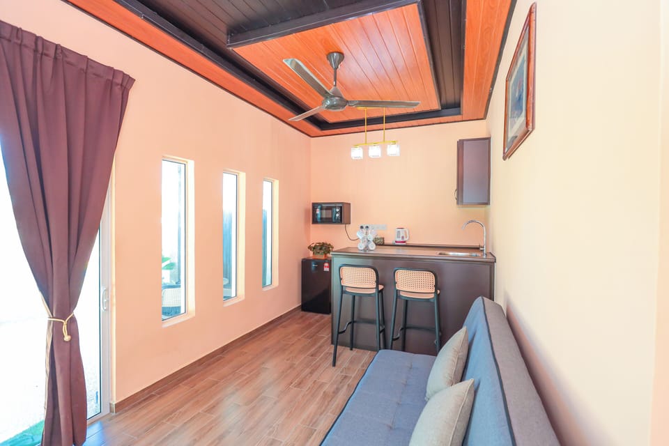 Two-Bedroom Villa | Living area | 40-inch LED TV with digital channels
