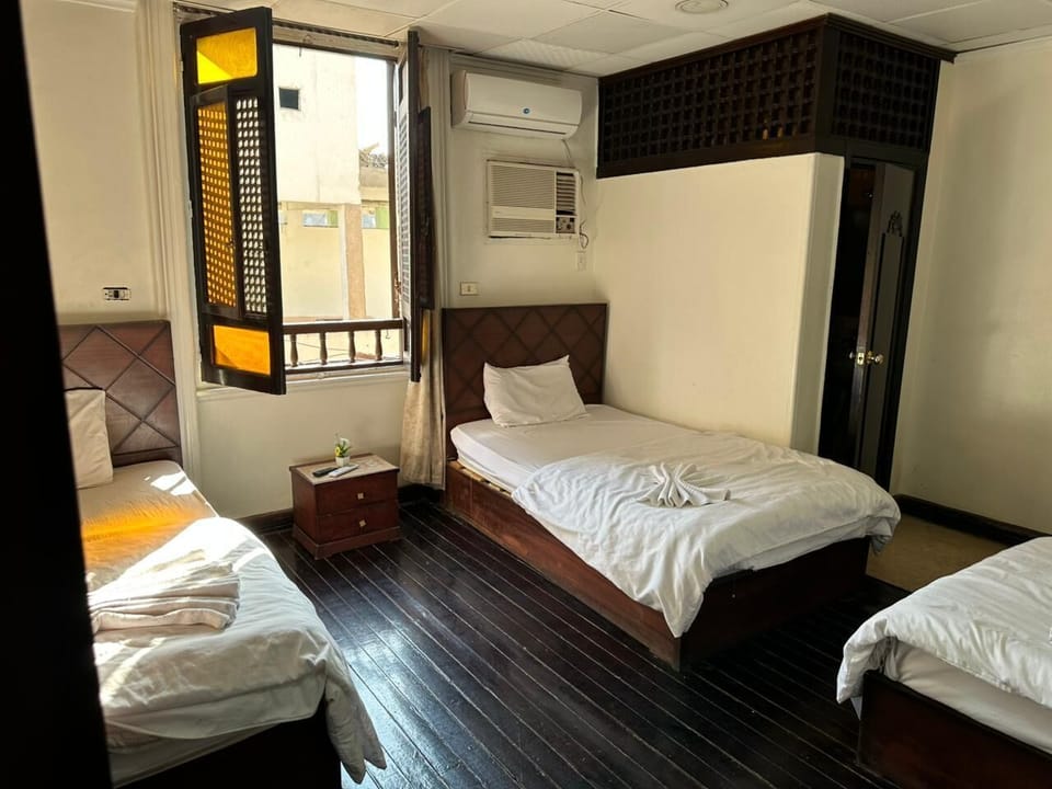 Classic Triple Room, City View | Soundproofing, free WiFi